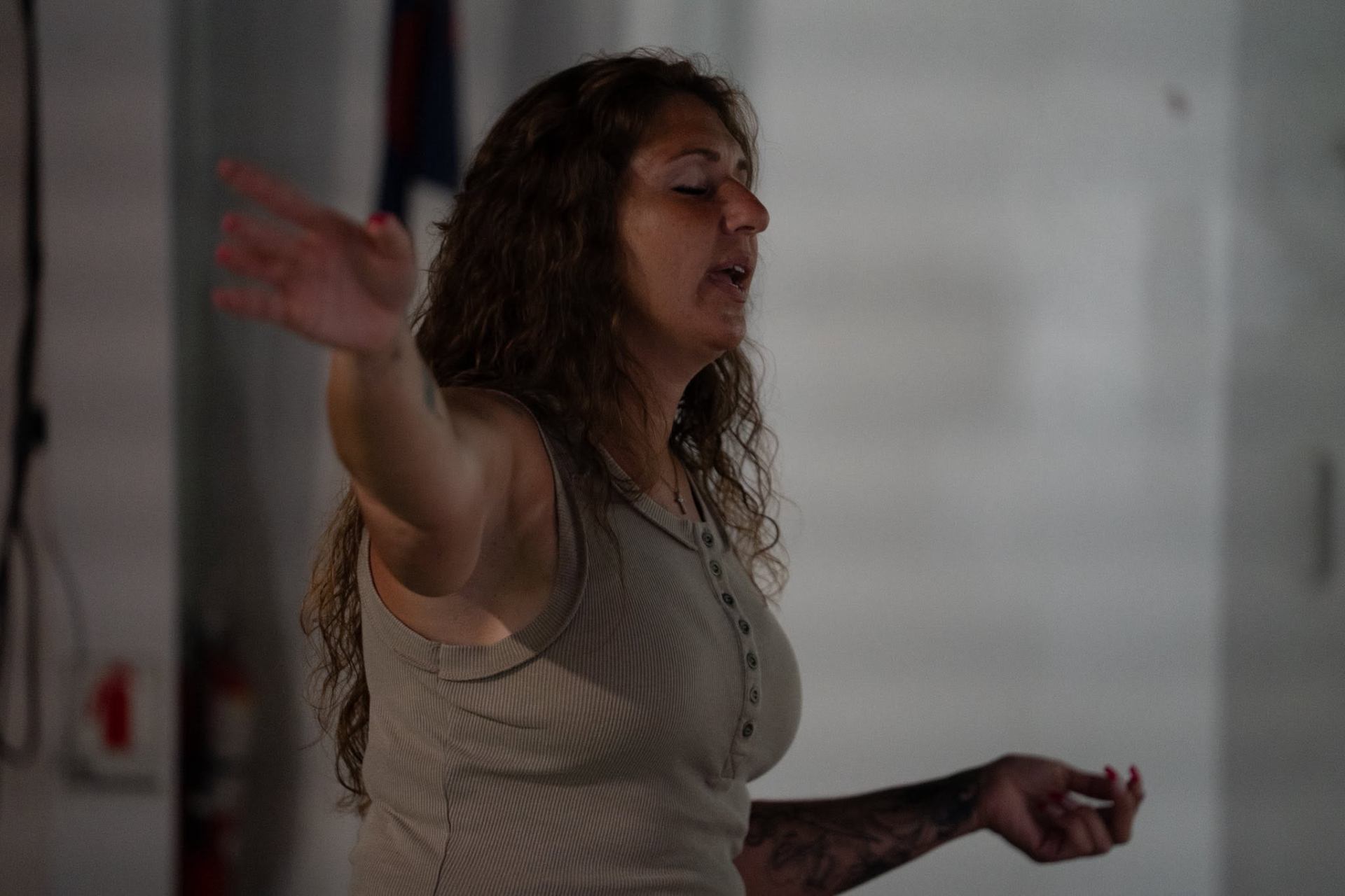 A worshipper with hands lifted