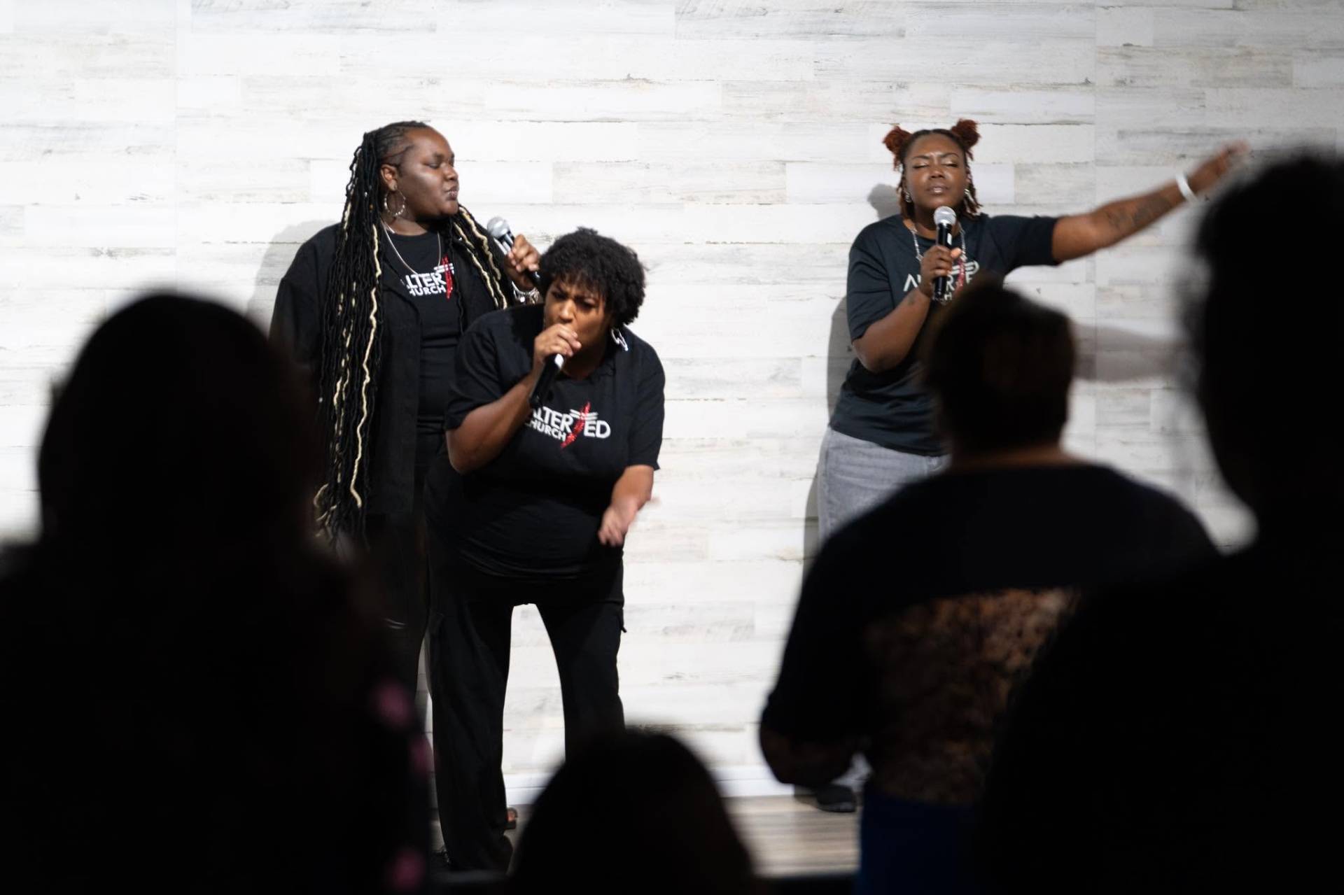 Worship vocalists leading the room